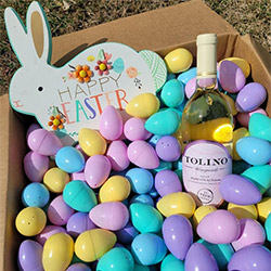 easter eggs with a bottle of wine